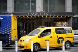 Migrants staying at Row Hotel shelter in Midtown begin receiving notices to relocate
